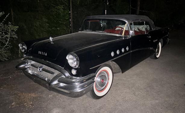 1955 Buick Century Convertible top up, nighttime, and a little dusty