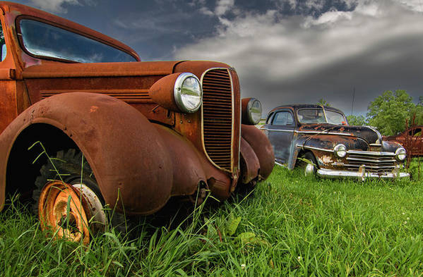 Oldies & goodies truck and car with gangster chrome grills:

https://pixels.com/featured/oldies-and-goodies-norma-brandsberg.html