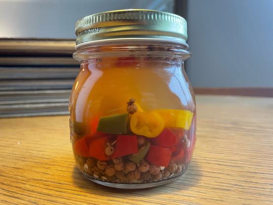 Pickled red, green, and yellow colour chillies   Sichuan pepper.
