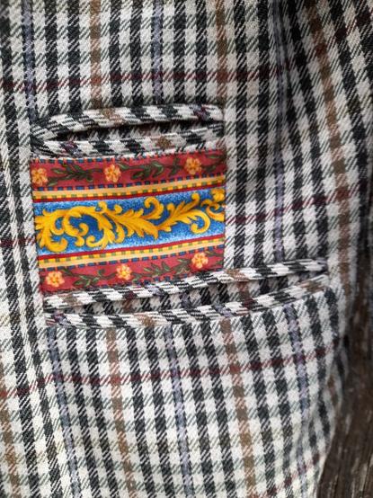 Detail with a patch between two pockets.
