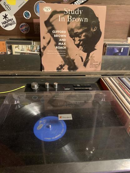 Study In Brown on the turntable - brown monotone photo of Clifford Veown playing trumpet in profile on the cover.