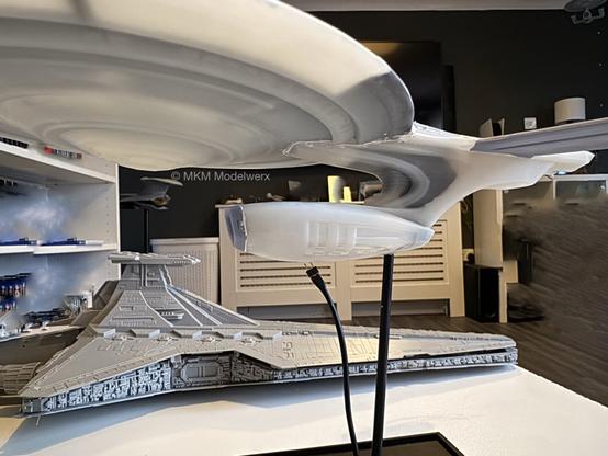 A side view showing the saucer section attached to the secondary hull assembly.