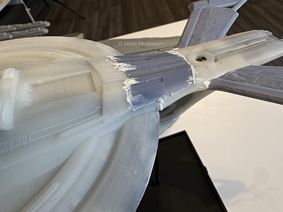 Top of the model showing white milliput applied round a top piece which covers most of the wiring joins.
