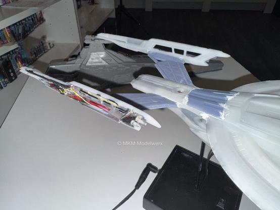 Starboard nacelle glued into place showing all the cables and LEDs on the inside.