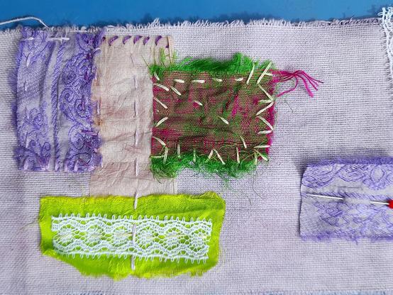 Silk, teabag, and lace scraps fixed with wild and wobbly stitches in bright yellow and purple. I have no idea what I want to stitch and let me guide intuitively by the scraps and their colours. It's like painting or making a collage with paper and mixed media.