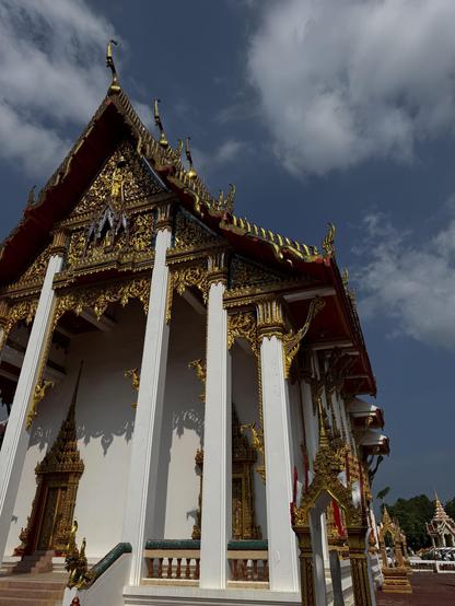 Gilded temple building at Wat Chalong in typical Thai tradition.