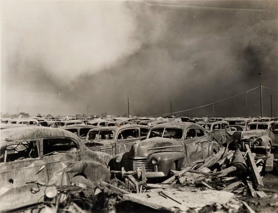 Parking lot 1⁄4 mile (400 m) away from the explosion, filled with damaged cars. By University of Houston Digital Library - University of Houston Digital Library, Public Domain, https://commons.wikimedia.org/w/index.php?curid=11834231