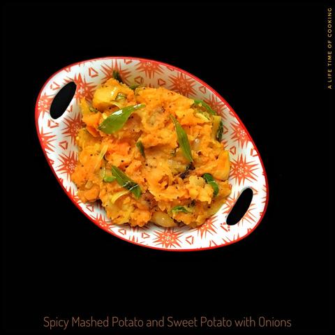 The mash, orange, sits in a white bowl with red patterns. It is topped with sauteed curry leaves.