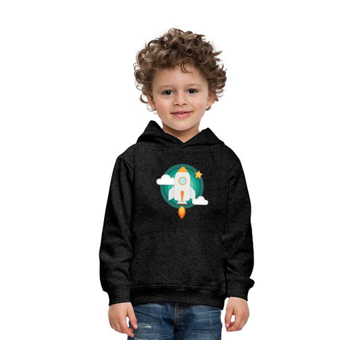 A boy is wearing a black sweatshirt with a picture of a rocket on it.