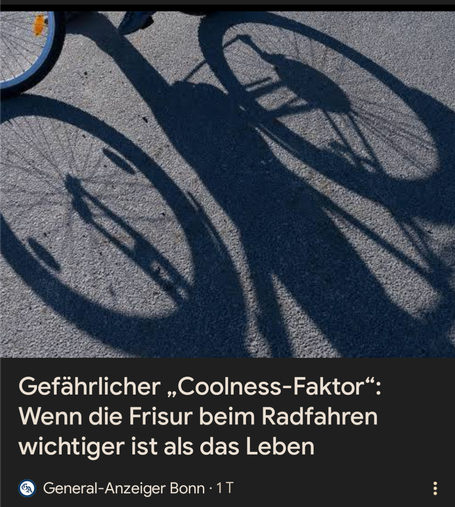 Das Bild zeigt die Schatten eines Fahrrads auf einer asphaltierten Straße. Die Schatten der Räder und des Fahrradsrahmens sind deutlich sichtbar und fallen aufgrund der Sonnenposition stark nach links. Der Text im Bild lautet: "Gefährlicher „Coolness-Faktor“: Wenn die Frisur beim Radfahren wichtiger ist als das Leben" und ist von der Quelle "General-Anzeiger Bonn" mit der Nummer 1T.