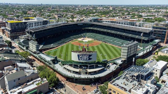 Wrigley Field with rooftop seating in the foreground.