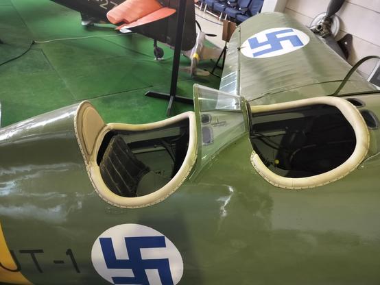 Blue and white swastika in an old plane that reminds me of the Nazi symbol