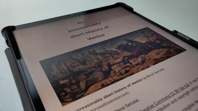 A photo of a tablet showing the e-book version of an Unreasonably short history of Venice.