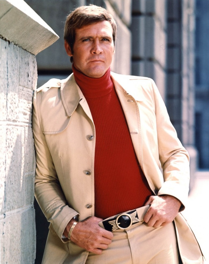 A photo of actor Lee Majors as the Six Million Dollar Man. He's wearing a leisure suit with a turtleneck.