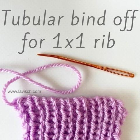 A swatch in lilac yarn in 1x1 rib on which the tubular bind off is worked with an orange darning needle.