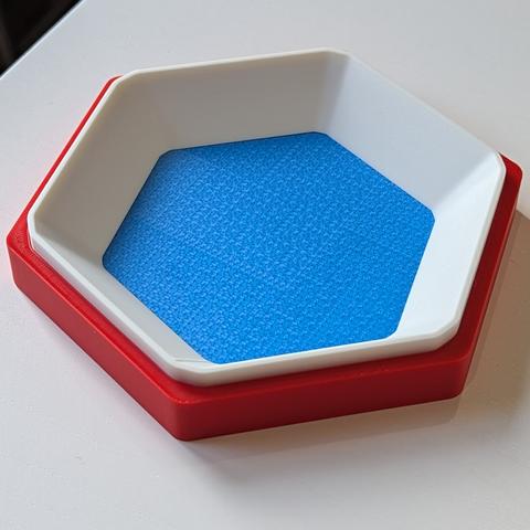 Red, white and blue hexagonal cup for boardgames pieces