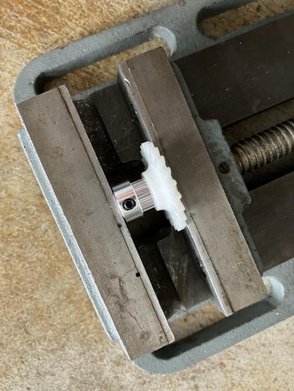 pressing the pulley into the gear with a vise