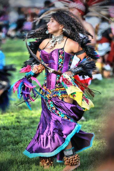 Young person dancing in regalia celebrating the Mexica New Year 2025