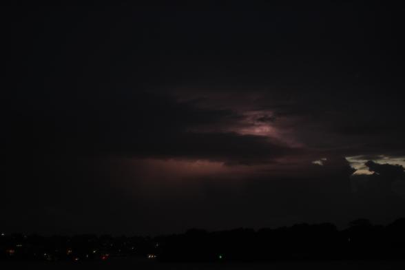 Lightning behind the cloud