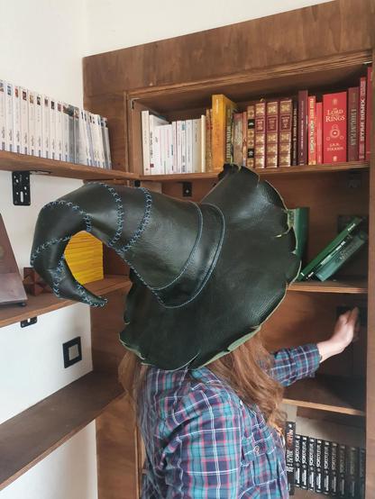 "Witch hat of sky" inspired by Pratchett works, in soft vegtan leather, hand sewn in cross and saddle stitch.