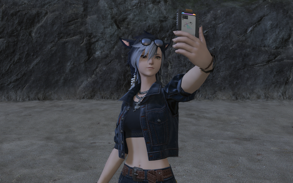 A blue-haired miqo'te, holding out her tomestone with one hand and smiling.