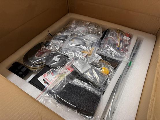 A formbot 2.4r2 pro+ 3d printer kit still in the box. There are just oodles of components sitting in ziplock baggies waiting for their turn to be assembled.