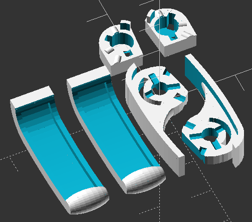 6 3D models grouped by pairs, with complex cutouts.