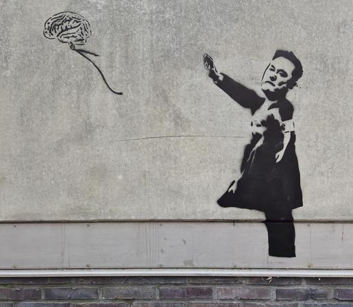 Graffiti des Streetart-Künstlers NEAL in der Hamburger Hafencity: Elon Musk mit faschistischem Gruß und davonfliegendem Gehirn