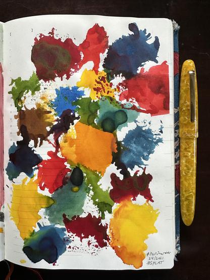 #splats of different coloured inks all over the page.