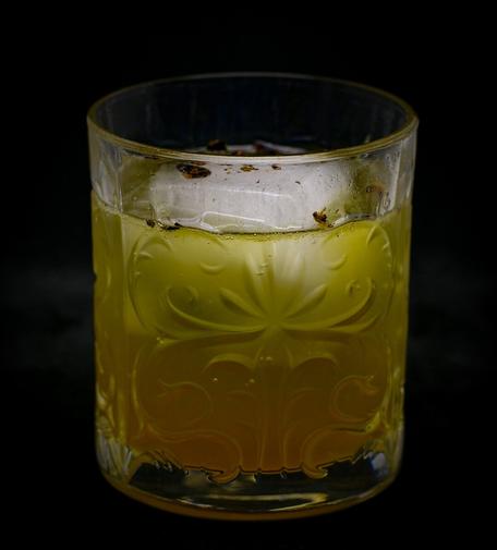 the cocktail itself in a tumbler and garnish with gin berries