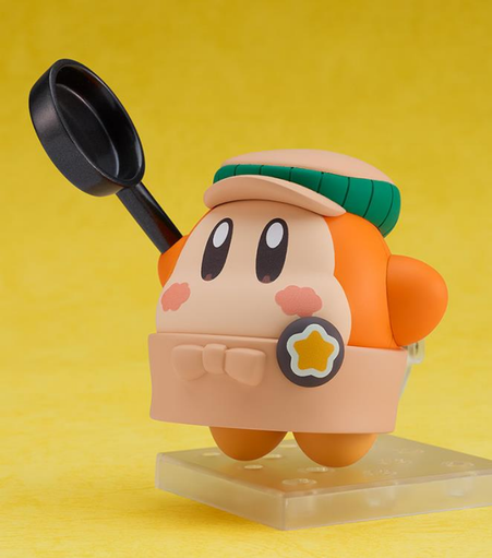 the figure now holding a frying pan