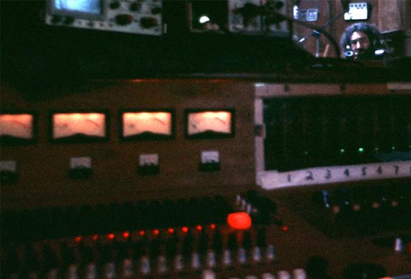 studio control board at Ace's with Jerry Garcia peering over it in the semi-distance