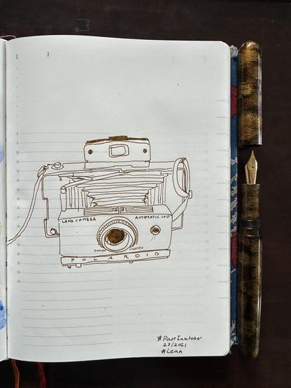 Sketch in sketchbook of an old fashioned Polaroid land camera