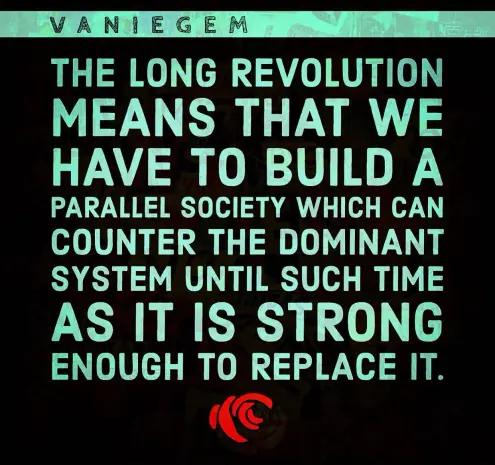 the text reads "the long revolution means that we have to build a parallel society which can counter the dominant system until such time as it is strong enough to replace it." beneath the text there is a picture of a rose bisected by the red and black anarcho-communist colors.