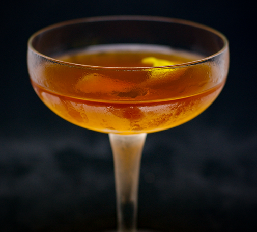 the cocktail itself in a chilled coupe and garnish with a lemon twist