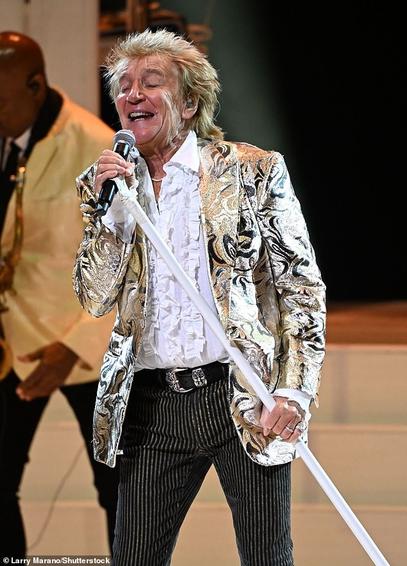 Sir Rod Stewart allegedly partied at a bar in Krakow, Poland, for five hours before being led to his car by three minders on Wednesday (pictured in March this year)