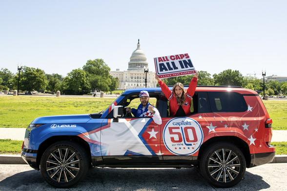 Mike Ploger and Annie Mae sit in the Weagle Wagon in front of the U.S. Capitol.