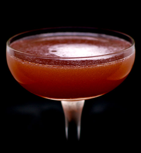The cocktail itself in a chilled coupe