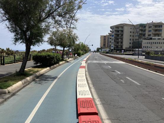 Seafront road with a beautiful protected cycle way on the way to the centre of Catania.