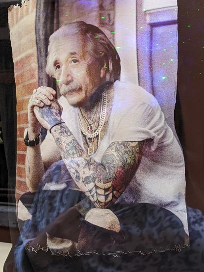 Tshirt print showing Einstein in jeans with tattoos