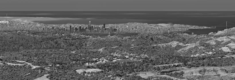 Greyscale panoramic photograph, with the lower half filled with rolling hills and grass and oak trees, which then dramatically open to dark water enclosing a city with yet more hills. A radio tower peeks out on the left and a famous bridge on the right.