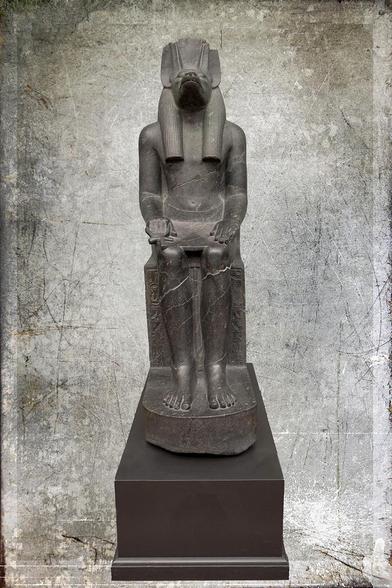 Statue of the jackal-headed Anubis. God of embalming. From the temple of Luxor., Egypt. Diorite. Reign of Amenophis III. 1403-1365 BC. Ny Carlsberg Glyptotek, Copenhagen

Anubis, ancient Egyptian god of funerary practices and care of the dead, represented by a jackal or the figure of a man with the head of a jackal. In the Early Dynastic period and the Old Kingdom, he enjoyed a preeminent (though not exclusive) position as lord of the dead, but he was later overshadowed by Osiris. His role is reflected in such epithets as “He Who Is upon His Mountain” (i.e., the necropolis), “Lord of the Sacred Land,” “Foremost of the Westerners,” and “He Who Is in the Place of Embalming.”