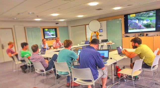 people in a room listening to a speaker, data science Cornwall meetup