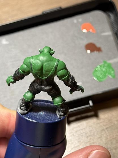 The Rumbleslam orc wrestler from the back after the first blocking in of the first base color(green).