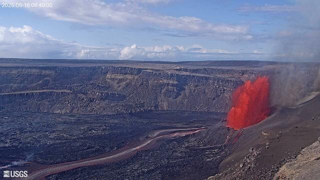 Amazingly colorful lava fountain in Hawai’i Volcanoes National Park this morning. Lava streams, the lava lake, and the exposed geology speak of highly dynamic change, while the blue sky and drifting clouds above suggest a calmer atmosphere. Thanks to the U. S. Geological Survey and the National Park Service for these beautiful views.