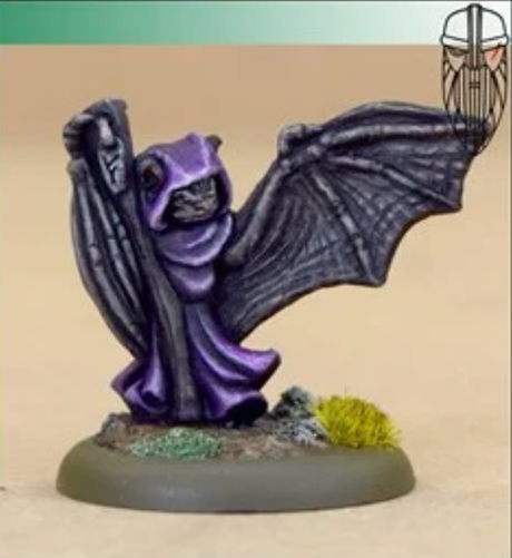 We have an 22mm model of an anthropomorphic grey bat with a purple hooded cloak and raising their wings menacingly.