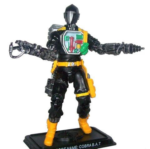 another photo of the figure with different arm attachments, two blasters, one is sort of a claw-shape