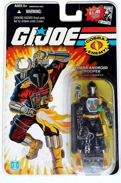 the figure in the packaging, decals ad illustrations on it, 'g..i. joe' in large letters at the top with red, white, and blue stripes trailing it, an illustration of the robot on the left side , running in front of an explosion, shooting  a flamethrower from its arm