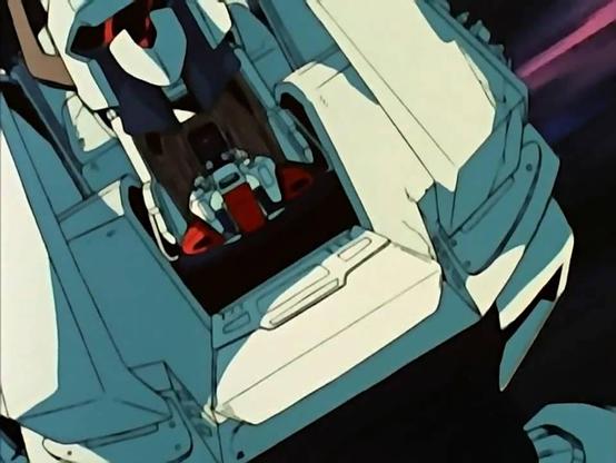 an image  from the animated show, it is of the head and chest of the giant fighting robot opening,, a man at a cockpit inside