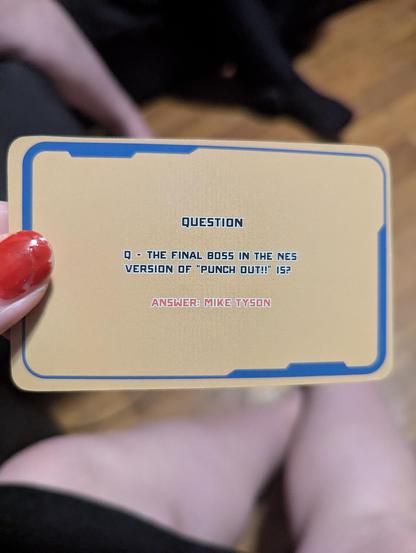 The offending card simply asking who the final boss is in the NES game "Punch Out!!" and indicating Mike Tyson - even though when his name was dropped from the title, he was replaced at the final boss